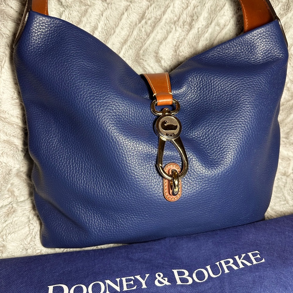 Brand New Dooney & Bourke Midnight Blue logo lock pebbled  leather hobo.